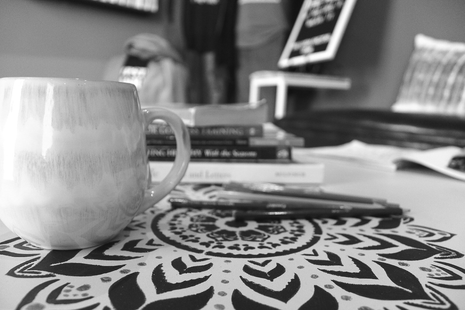 A coffee mug, books, and coloring books make patients feel at home.